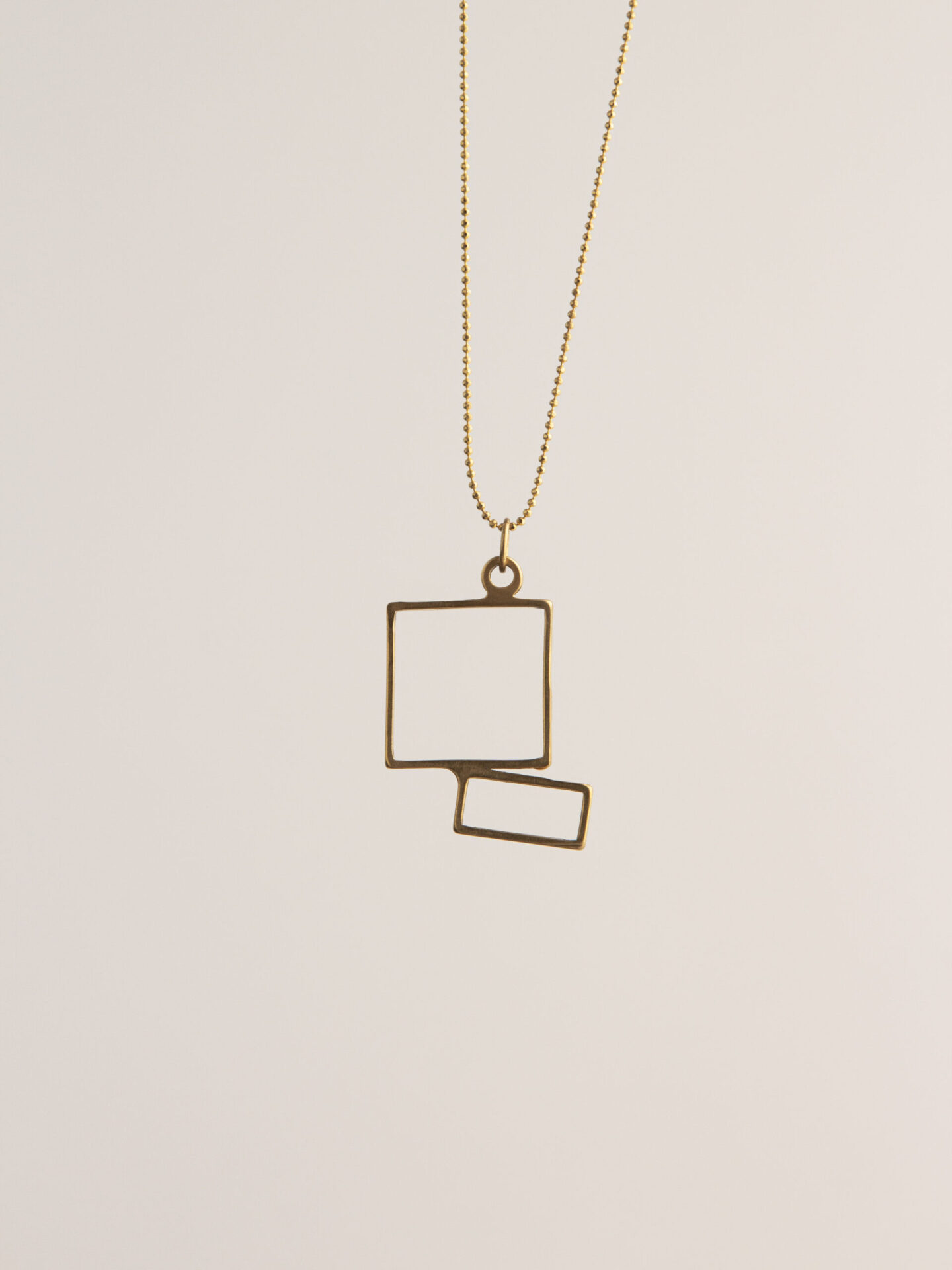 Gold-Plated geometric shaped necklace.