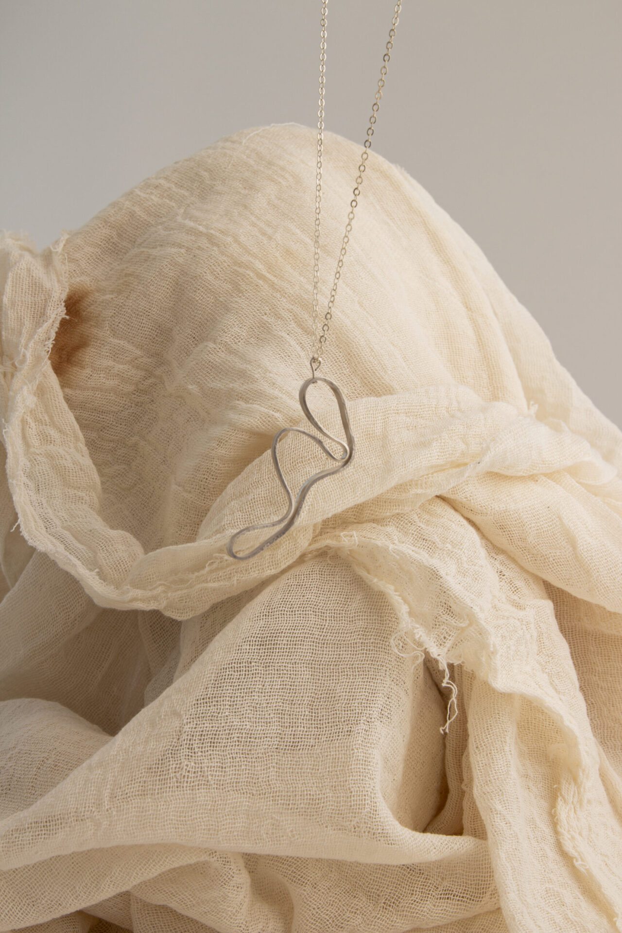 Abstract shaped ornament 18K gold-plated necklace.