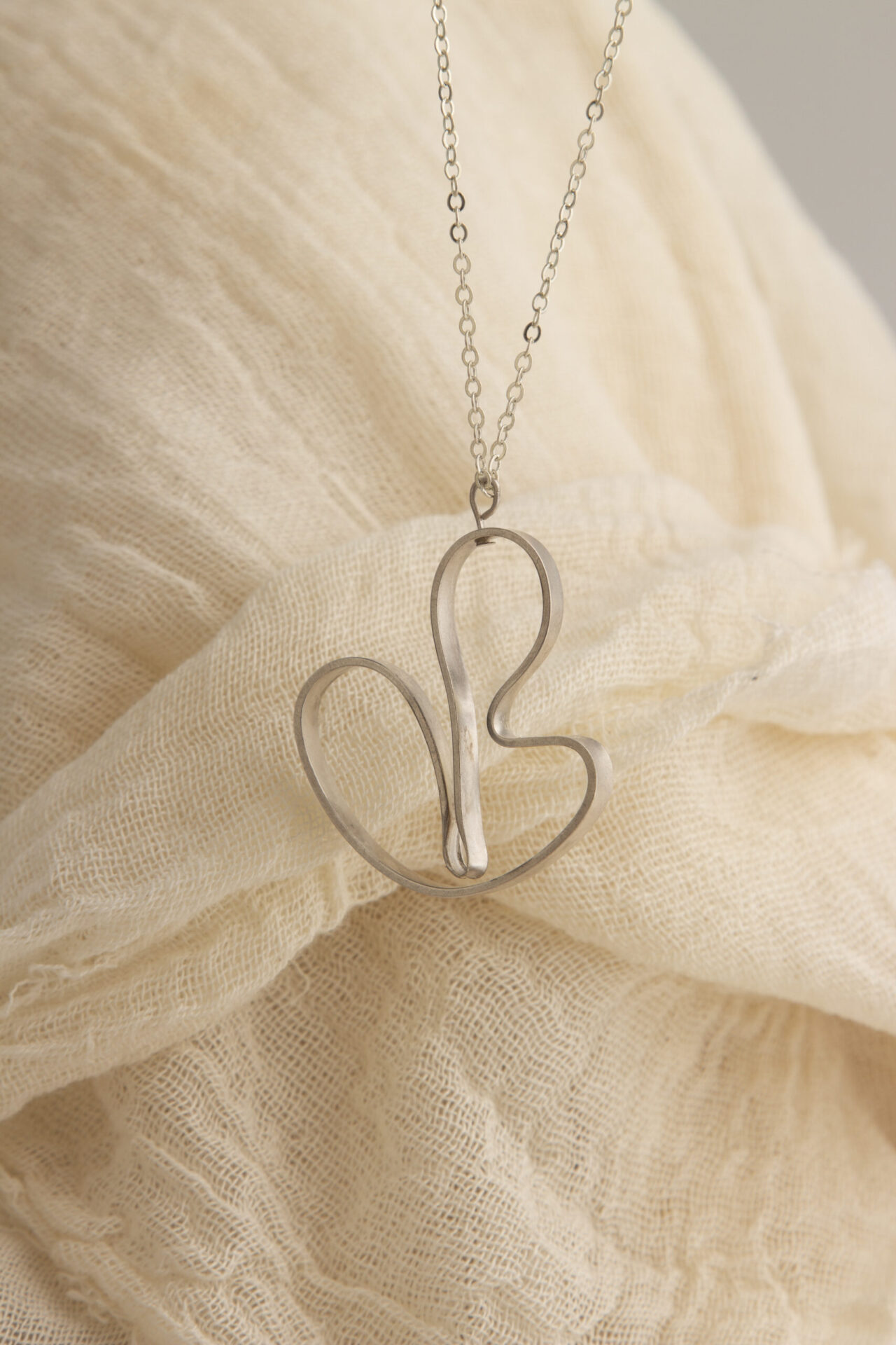 Abstract shaped ornament 18K gold-plated necklace.