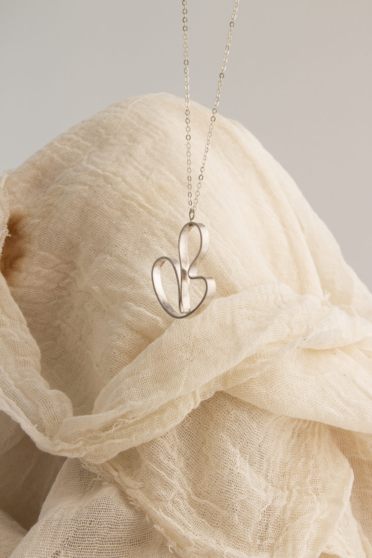 Abstract shaped ornament 18K gold-plated necklace.