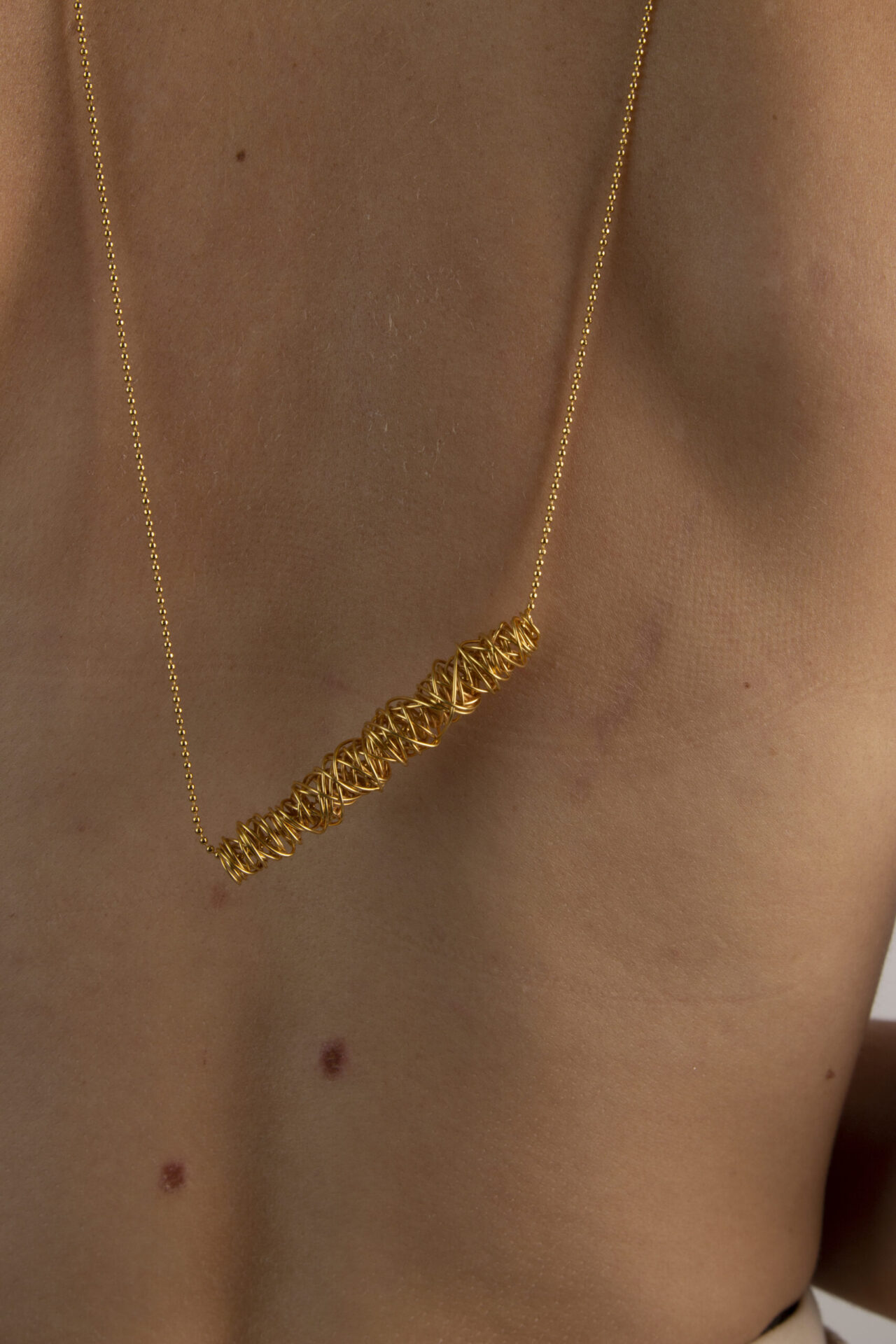 tangled line Gold-Plated handcrafted necklace.